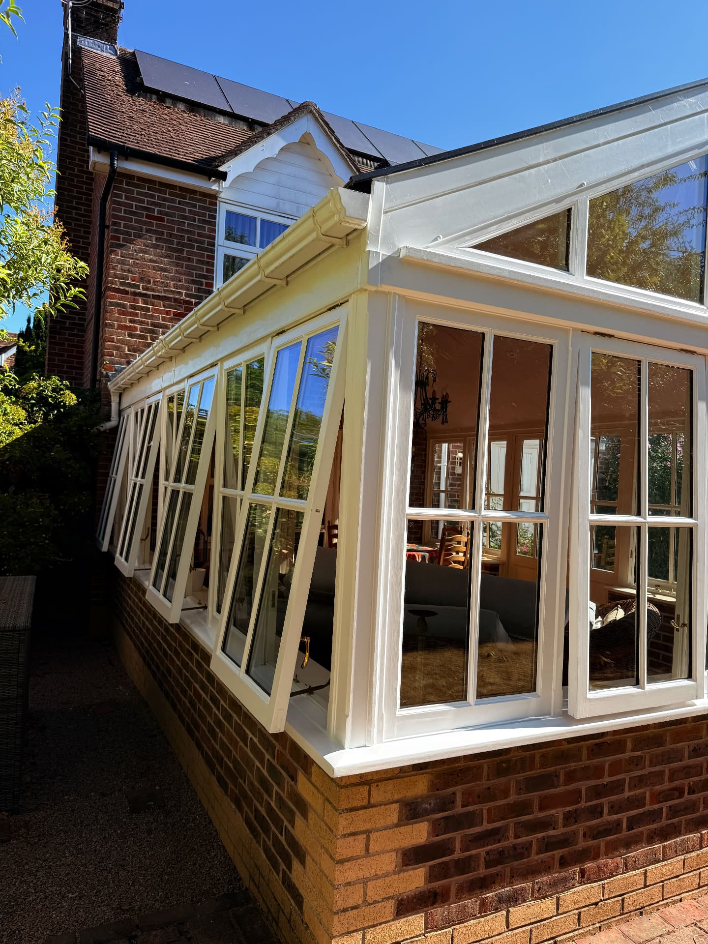 Side view of freshly painted conservatory frames