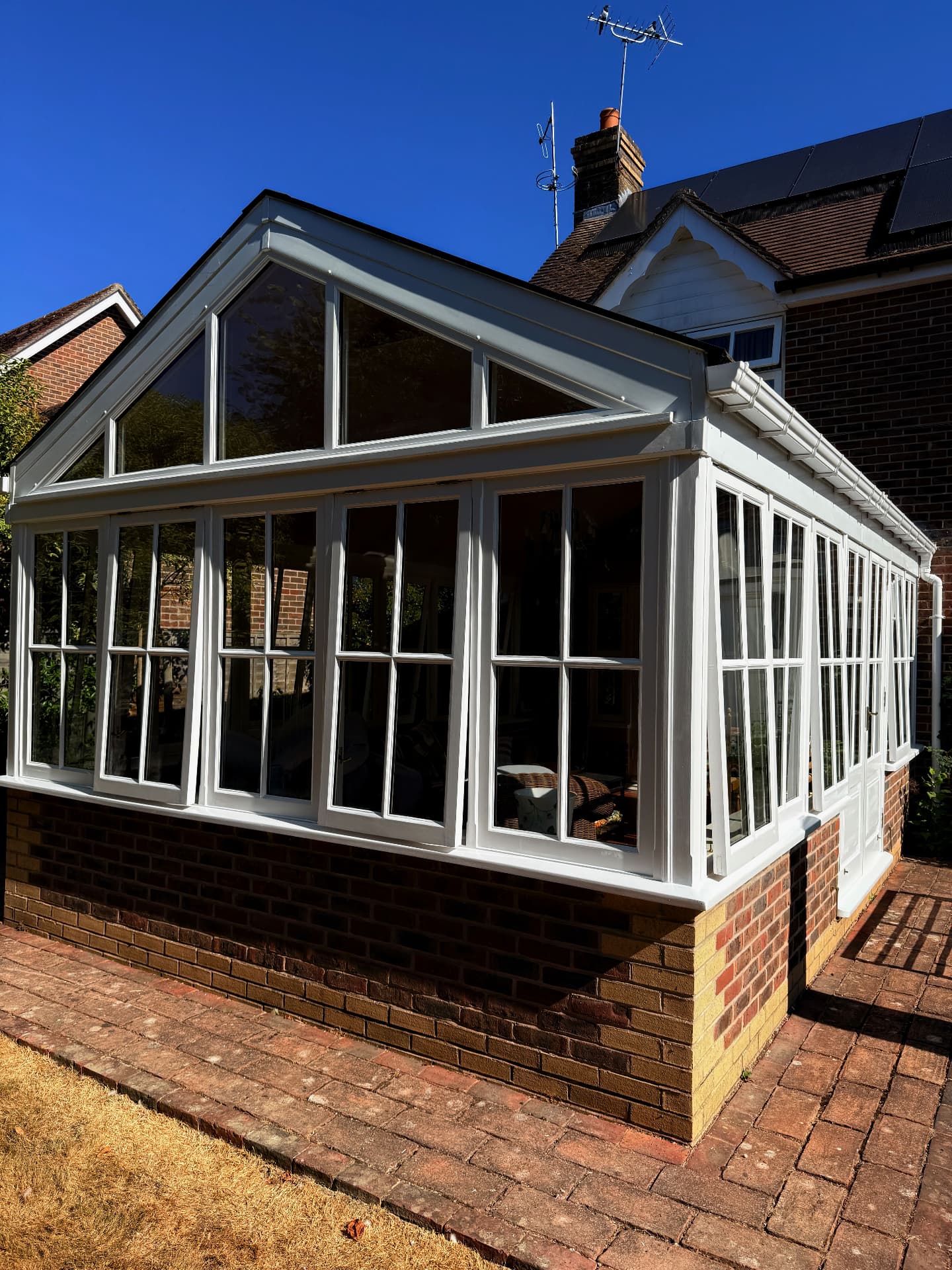 Front view of the finished white conservatory