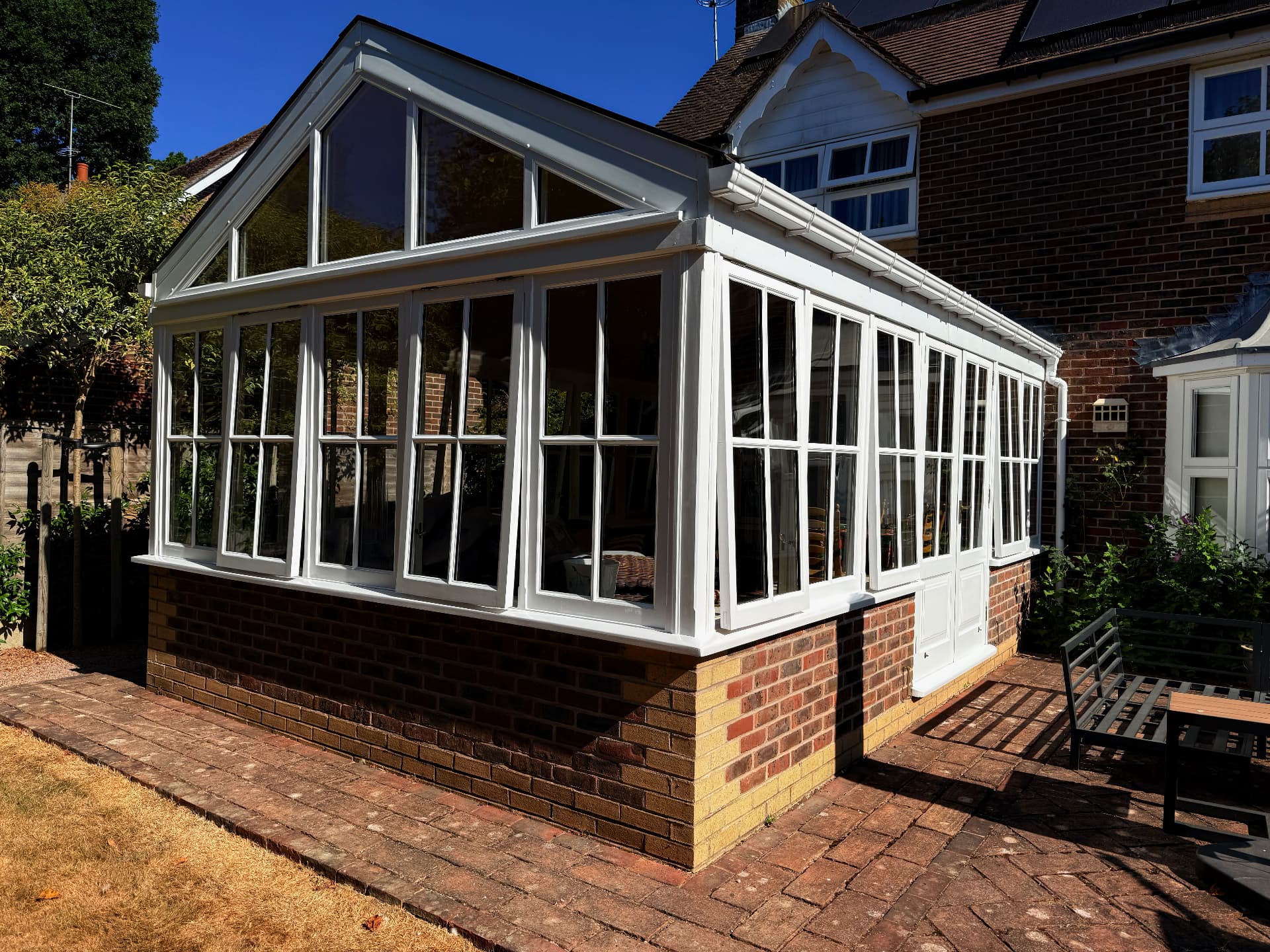 Finished white timber conservatory after repainting