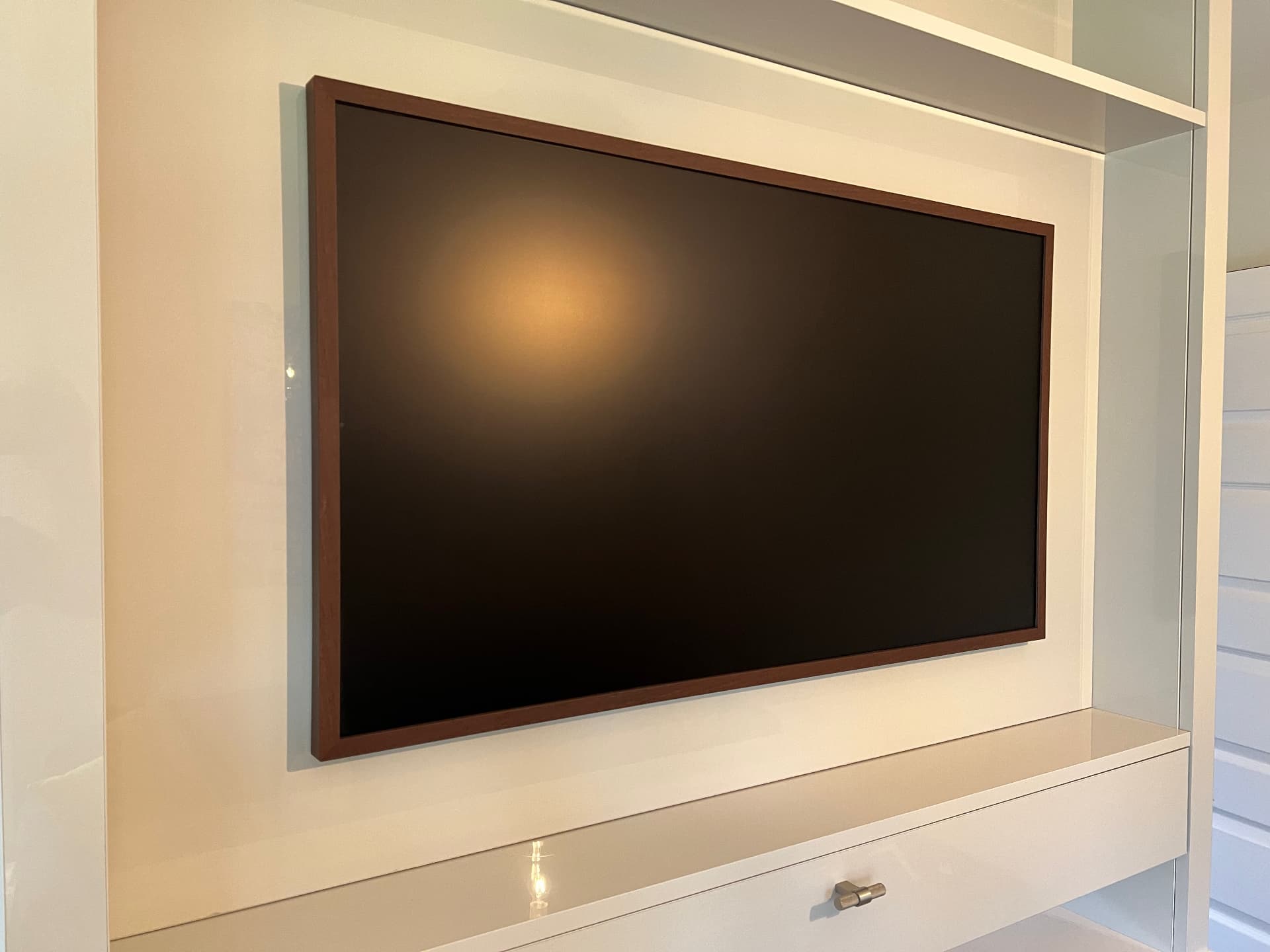 Samsung art TV set neatly into the framed back panel